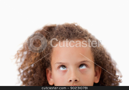 To use this stock image in your creative project, please select the size you need over to the right and click the "Add to Cart" button.
Your downloaded image will come with the Cutcaster watermark removed so don’t worry about the watermark you see on this page. Close up of a playful girl looking above her stock photo, Close up of a playful girl looking above her against a white background by Wavebreak Media