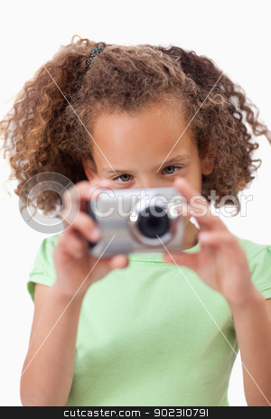 To use this stock image in your creative project, please select the size you need over to the right and click the "Add to Cart" button.
Your downloaded image will come with the Cutcaster watermark removed so don’t worry about the watermark you see on this page. Portrait of a girl taking a picture stock photo, Portrait of a girl taking a picture against a white background by Wavebreak Media