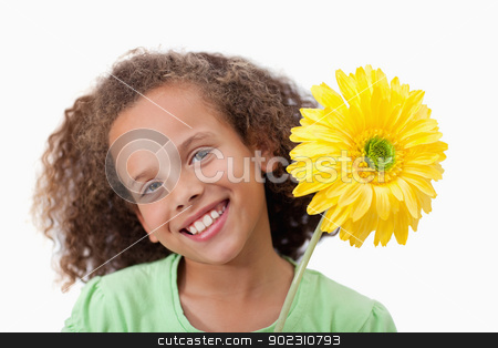 To use this stock image in your creative project, please select the size you need over to the right and click the "Add to Cart" button.
Your downloaded image will come with the Cutcaster watermark removed so don’t worry about the watermark you see on this page. Cute girl holding a flower stock photo, Cute girl holding a flower against a white background by Wavebreak Media