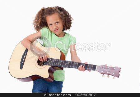 To use this stock image in your creative project, please select the size you need over to the right and click the "Add to Cart" button.
Your downloaded image will come with the Cutcaster watermark removed so don’t worry about the watermark you see on this page. Girl playing the guitar stock photo, Girl playing the guitar against a white background by Wavebreak Media