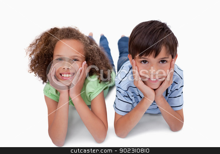 To use this stock image in your creative project, please select the size you need over to the right and click the "Add to Cart" button.
Your downloaded image will come with the Cutcaster watermark removed so don’t worry about the watermark you see on this page. Lovely friends lying on the floor stock photo, Lovely friends lying on the floor against a white background by Wavebreak Media