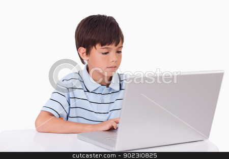 To use this stock image in your creative project, please select the size you need over to the right and click the "Add to Cart" button.
Your downloaded image will come with the Cutcaster watermark removed so don’t worry about the watermark you see on this page. Boy using a laptop stock photo, Boy using a laptop against a white background by Wavebreak Media