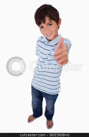 To use this stock image in your creative project, please select the size you need over to the right and click the "Add to Cart" button.
Your downloaded image will come with the Cutcaster watermark removed so don’t worry about the watermark you see on this page. Portrait of a boy smiling at the camera with the thumb up stock photo, Portrait of a boy smiling at the camera with the thumb up against a white background by Wavebreak Media