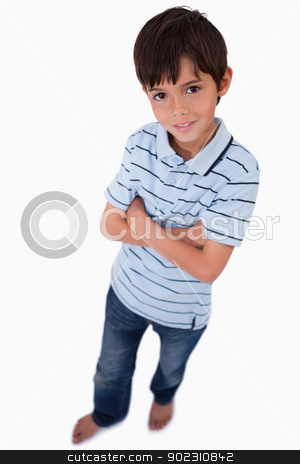 To use this stock image in your creative project, please select the size you need over to the right and click the "Add to Cart" button.
Your downloaded image will come with the Cutcaster watermark removed so don’t worry about the watermark you see on this page. Portrait of a boy smiling at the camera with the arms crossed stock photo, Portrait of a boy smiling at the camera with the arms crossed against a white background by Wavebreak Media