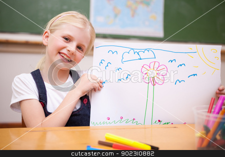 To use this stock image in your creative project, please select the size you need over to the right and click the "Add to Cart" button.
Your downloaded image will come with the Cutcaster watermark removed so don’t worry about the watermark you see on this page. Smiling girl showing her drawing stock photo, Smiling girl showing her drawing in a classroom by Wavebreak Media