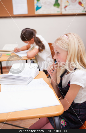 To use this stock image in your creative project, please select the size you need over to the right and click the "Add to Cart" button.
Your downloaded image will come with the Cutcaster watermark removed so don’t worry about the watermark you see on this page. Portrait of pupils doing classwork stock photo, Portrait of pupils doing classwork in a classroom by Wavebreak Media