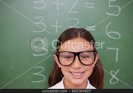 To use this stock image in your creative project, please select the size you need over to the right and click the "Add to Cart" button.
Your downloaded image will come with the Cutcaster watermark removed so don’t worry about the watermark you see on this page. Smart schoolgirl posing stock photo, Smart schoolgirl posing in front of a blackboard by Wavebreak Media