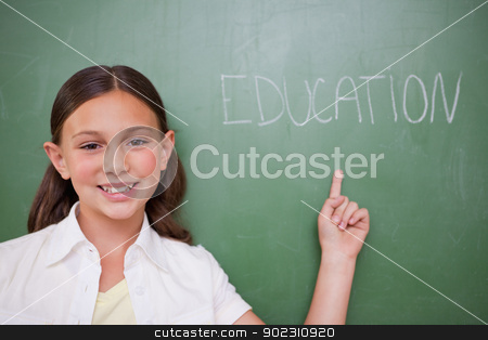 To use this stock image in your creative project, please select the size you need over to the right and click the "Add to Cart" button.
Your downloaded image will come with the Cutcaster watermark removed so don’t worry about the watermark you see on this page. Schoolgirl pointing at a word stock photo, Schoolgirl pointing at a word on a blackboard by Wavebreak Media