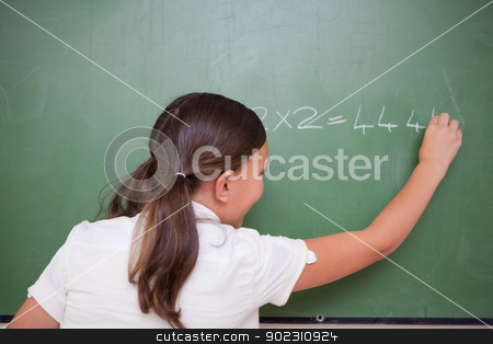 To use this stock image in your creative project, please select the size you need over to the right and click the "Add to Cart" button.
Your downloaded image will come with the Cutcaster watermark removed so don’t worry about the watermark you see on this page. Schoolgirl writing numbers stock photo, Schoolgirl writing numbers on a blackboard by Wavebreak Media