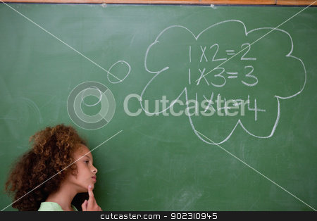 To use this stock image in your creative project, please select the size you need over to the right and click the "Add to Cart" button.
Your downloaded image will come with the Cutcaster watermark removed so don’t worry about the watermark you see on this page. Schoolgirl thinking about algebra stock photo, Schoolgirl thinking about algebra in front of a blackboard by Wavebreak Media