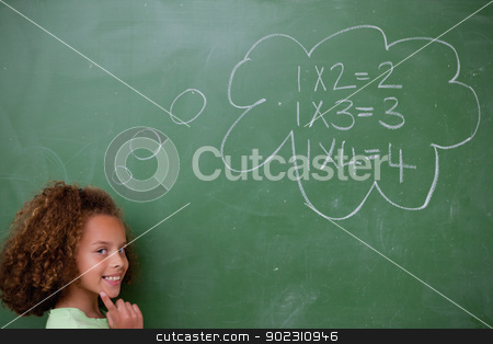 To use this stock image in your creative project, please select the size you need over to the right and click the "Add to Cart" button.
Your downloaded image will come with the Cutcaster watermark removed so don’t worry about the watermark you see on this page. Schoolgirl thinking about mathematics stock photo, Schoolgirl thinking about mathematics in front of a blackboard by Wavebreak Media
