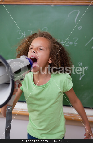 To use this stock image in your creative project, please select the size you need over to the right and click the "Add to Cart" button.
Your downloaded image will come with the Cutcaster watermark removed so don’t worry about the watermark you see on this page. Portrait of a cute schoolgirl screaming through a megaphone stock photo, Portrait of a cute schoolgirl screaming through a megaphone in a classroom by Wavebreak Media