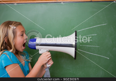 To use this stock image in your creative project, please select the size you need over to the right and click the "Add to Cart" button.
Your downloaded image will come with the Cutcaster watermark removed so don’t worry about the watermark you see on this page. Young schoolgirl screaming through a megaphone stock photo, Young schoolgirl screaming through a megaphone in front of blackboard by Wavebreak Media