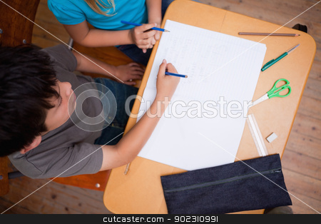 To use this stock image in your creative project, please select the size you need over to the right and click the "Add to Cart" button.
Your downloaded image will come with the Cutcaster watermark removed so don’t worry about the watermark you see on this page. Above view of pupils working together stock photo, Above view of pupils working together in a classroom by Wavebreak Media