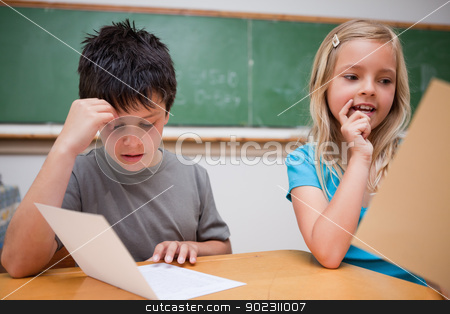 To use this stock image in your creative project, please select the size you need over to the right and click the "Add to Cart" button.
Your downloaded image will come with the Cutcaster watermark removed so don’t worry about the watermark you see on this page. Two children reading stock photo, Two children reading in a classroom by Wavebreak Media