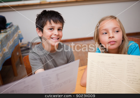 To use this stock image in your creative project, please select the size you need over to the right and click the "Add to Cart" button.
Your downloaded image will come with the Cutcaster watermark removed so don’t worry about the watermark you see on this page. Pupils receiving their school report stock photo, Pupils receiving their school report in a classroom by Wavebreak Media