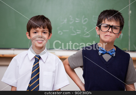 To use this stock image in your creative project, please select the size you need over to the right and click the "Add to Cart" button.
Your downloaded image will come with the Cutcaster watermark removed so don’t worry about the watermark you see on this page. Schoolboys posing in front of a chalkboard stock photo, Schoolboys posing in front of a chalkboard in a classroom by Wavebreak Media