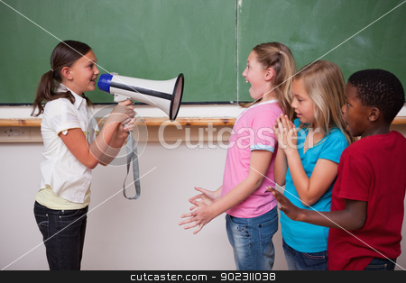 To use this stock image in your creative project, please select the size you need over to the right and click the "Add to Cart" button.
Your downloaded image will come with the Cutcaster watermark removed so don’t worry about the watermark you see on this page. Schoolgirl screaming through a megaphone to her classmates stock photo, Schoolgirl screaming through a megaphone to her classmates in a classroom by Wavebreak Media