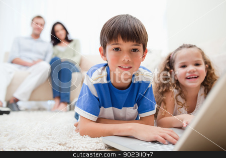 To use this stock image in your creative project, please select the size you need over to the right and click the "Add to Cart" button.
Your downloaded image will come with the Cutcaster watermark removed so don’t worry about the watermark you see on this page. Cute kids playing computer games on laptop stock photo, Cute kids playing computer games on laptop together by Wavebreak Media