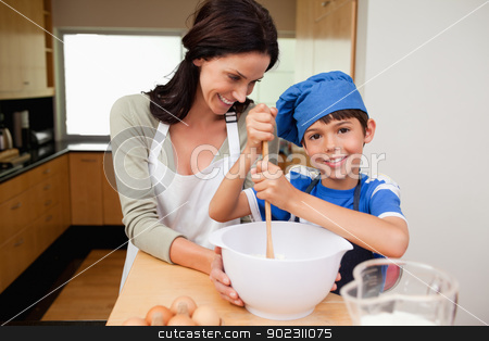 To use this stock image in your creative project, please select the size you need over to the right and click the "Add to Cart" button.
Your downloaded image will come with the Cutcaster watermark removed so don’t worry about the watermark you see on this page. Mother and son having fun preparing a cake stock photo, Mother and son having fun preparing a cake together by Wavebreak Media