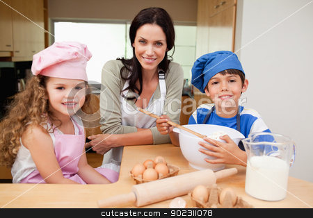 To use this stock image in your creative project, please select the size you need over to the right and click the "Add to Cart" button.
Your downloaded image will come with the Cutcaster watermark removed so don’t worry about the watermark you see on this page. Mother and her children preparing cake stock photo, Mother and her children preparing cake together by Wavebreak Media