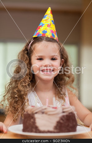 To use this stock image in your creative project, please select the size you need over to the right and click the "Add to Cart" button.
Your downloaded image will come with the Cutcaster watermark removed so don’t worry about the watermark you see on this page. Girl with a slice of cake in front of her stock photo, Smiling girl with a slice of cake in front of her by Wavebreak Media
