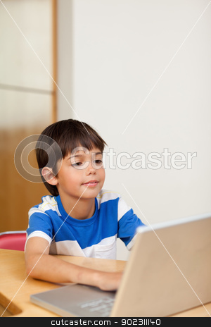 To use this stock image in your creative project, please select the size you need over to the right and click the "Add to Cart" button.
Your downloaded image will come with the Cutcaster watermark removed so don’t worry about the watermark you see on this page. Boy playing computer games on the laptop stock photo, Little boy playing computer games on the laptop by Wavebreak Media