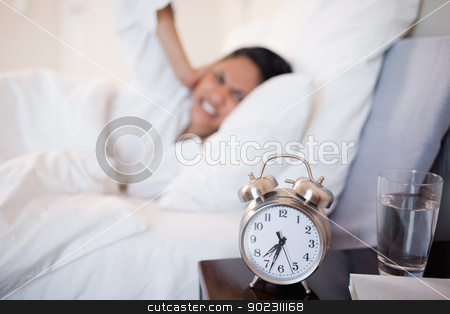 To use this stock image in your creative project, please select the size you need over to the right and click the "Add to Cart" button.
Your downloaded image will come with the Cutcaster watermark removed so don’t worry about the watermark you see on this page. Alarm clock making woman cover her ears stock photo, Alarm clock making young woman cover her ears by Wavebreak Media