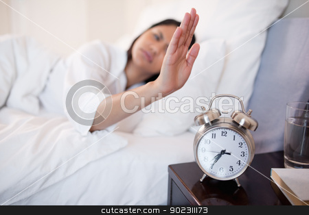 To use this stock image in your creative project, please select the size you need over to the right and click the "Add to Cart" button.
Your downloaded image will come with the Cutcaster watermark removed so don’t worry about the watermark you see on this page. Alarm clock being turned off by woman stock photo, Alarm clock being turned off by young woman by Wavebreak Media