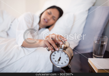 To use this stock image in your creative project, please select the size you need over to the right and click the "Add to Cart" button.
Your downloaded image will come with the Cutcaster watermark removed so don’t worry about the watermark you see on this page. Alarm clock almost falling off the bedside locker while being tu stock photo, Alarm clock almost falling off the bedside locker while being turned off by woman by Wavebreak Media