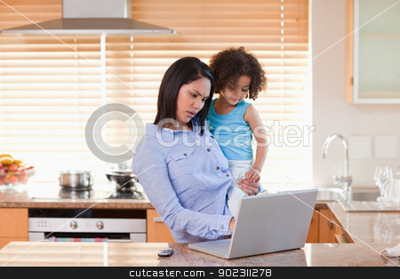 To use this stock image in your creative project, please select the size you need over to the right and click the "Add to Cart" button.
Your downloaded image will come with the Cutcaster watermark removed so don’t worry about the watermark you see on this page. Mother and daughter using laptop in the kitchen together stock photo, Young mother and daughter using laptop in the kitchen together by Wavebreak Media