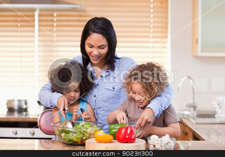 To use this stock image in your creative project, please select the size you need over to the right and click the "Add to Cart" button.
Your downloaded image will come with the Cutcaster watermark removed so don’t worry about the watermark you see on this page. Mother and daughters preparing salad in the kitchen together stock photo, Young mother and daughters preparing salad in the kitchen together by Wavebreak Media
