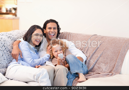 To use this stock image in your creative project, please select the size you need over to the right and click the "Add to Cart" button.
Your downloaded image will come with the Cutcaster watermark removed so don’t worry about the watermark you see on this page. Happy family watching television together stock photo, Happy young family watching television together by Wavebreak Media
