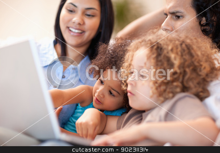 To use this stock image in your creative project, please select the size you need over to the right and click the "Add to Cart" button.
Your downloaded image will come with the Cutcaster watermark removed so don’t worry about the watermark you see on this page. Family having a good time at the laptop together stock photo, Young family having a good time at the laptop together by Wavebreak Media