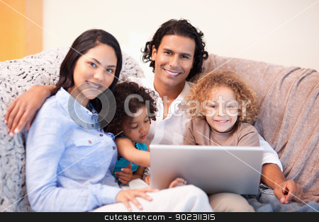 To use this stock image in your creative project, please select the size you need over to the right and click the "Add to Cart" button.
Your downloaded image will come with the Cutcaster watermark removed so don’t worry about the watermark you see on this page. Family using laptop on the sofa together stock photo, Young family using laptop on the sofa together by Wavebreak Media