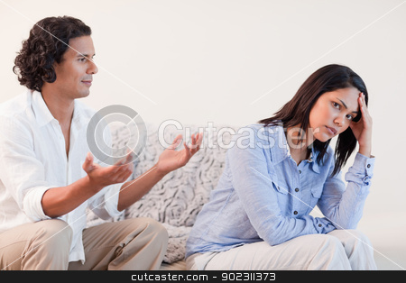 To use this stock image in your creative project, please select the size you need over to the right and click the "Add to Cart" button.
Your downloaded image will come with the Cutcaster watermark removed so don’t worry about the watermark you see on this page. Man on the sofa trying to apologize to his girlfriend stock photo, Young man on the sofa trying to apologize to his girlfriend by Wavebreak Media