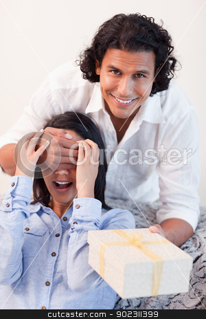 To use this stock image in your creative project, please select the size you need over to the right and click the "Add to Cart" button.
Your downloaded image will come with the Cutcaster watermark removed so don’t worry about the watermark you see on this page. Male having a surprise for his girlfriend stock photo, Young male having a surprise for his girlfriend by Wavebreak Media