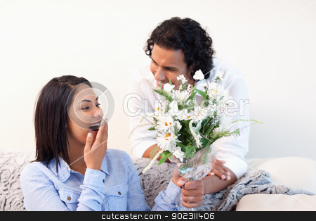 To use this stock image in your creative project, please select the size you need over to the right and click the "Add to Cart" button.
Your downloaded image will come with the Cutcaster watermark removed so don’t worry about the watermark you see on this page. Woman getting flowers from her boyfriend stock photo, Young woman getting flowers from her boyfriend by Wavebreak Media