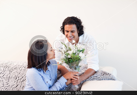 To use this stock image in your creative project, please select the size you need over to the right and click the "Add to Cart" button.
Your downloaded image will come with the Cutcaster watermark removed so don’t worry about the watermark you see on this page. Man giving his girlfriend flowers stock photo, Young man giving his girlfriend flowers by Wavebreak Media