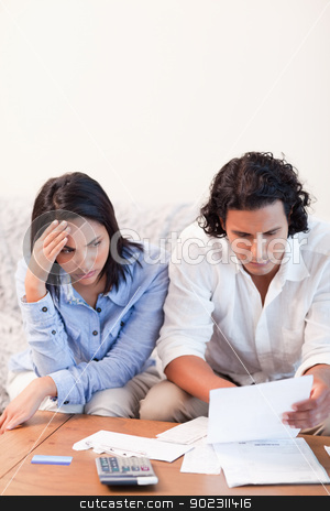 To use this stock image in your creative project, please select the size you need over to the right and click the "Add to Cart" button.
Your downloaded image will come with the Cutcaster watermark removed so don’t worry about the watermark you see on this page. Couple having financial problems stock photo, Young couple having financial problems by Wavebreak Media