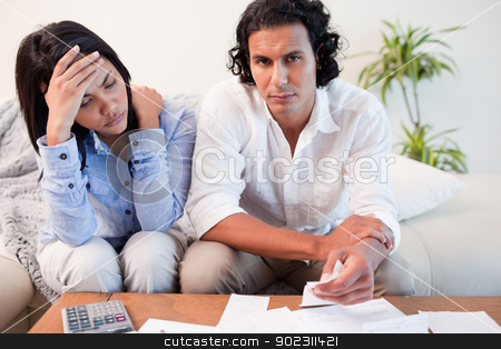 To use this stock image in your creative project, please select the size you need over to the right and click the "Add to Cart" button.
Your downloaded image will come with the Cutcaster watermark removed so don’t worry about the watermark you see on this page. Couple experiencing financial problems stock photo, Young couple experiencing financial problems by Wavebreak Media