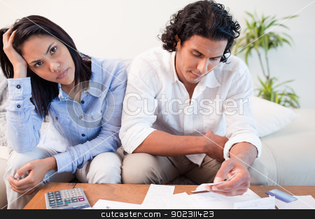 To use this stock image in your creative project, please select the size you need over to the right and click the "Add to Cart" button.
Your downloaded image will come with the Cutcaster watermark removed so don’t worry about the watermark you see on this page. Sad couple checking their bills stock photo, Sad young couple checking their bills by Wavebreak Media