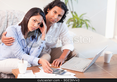 To use this stock image in your creative project, please select the size you need over to the right and click the "Add to Cart" button.
Your downloaded image will come with the Cutcaster watermark removed so don’t worry about the watermark you see on this page. Couple having a hard time paying their bills stock photo, Young couple having a hard time paying their bills by Wavebreak Media