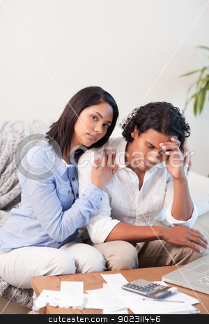 To use this stock image in your creative project, please select the size you need over to the right and click the "Add to Cart" button.
Your downloaded image will come with the Cutcaster watermark removed so don’t worry about the watermark you see on this page. Couple frustrated by their expenses stock photo, Young couple frustrated by their expenses by Wavebreak Media