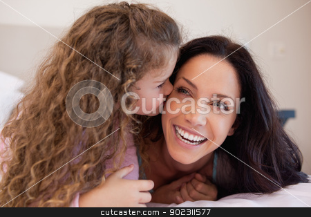 To use this stock image in your creative project, please select the size you need over to the right and click the "Add to Cart" button.
Your downloaded image will come with the Cutcaster watermark removed so don’t worry about the watermark you see on this page. Daughter giving her mother a kiss on the cheek stock photo, Little daughter giving her mother a kiss on the cheek by Wavebreak Media
