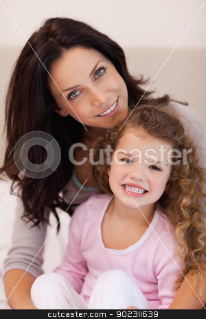 To use this stock image in your creative project, please select the size you need over to the right and click the "Add to Cart" button.
Your downloaded image will come with the Cutcaster watermark removed so don’t worry about the watermark you see on this page. Mother embracing her daughter stock photo, Young mother embracing her daughter by Wavebreak Media