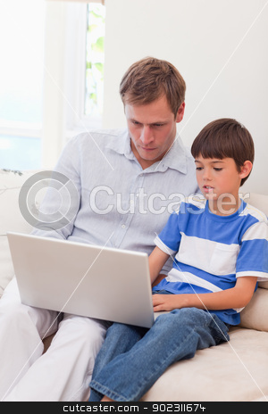 To use this stock image in your creative project, please select the size you need over to the right and click the "Add to Cart" button.
Your downloaded image will come with the Cutcaster watermark removed so don’t worry about the watermark you see on this page. Father and son surfing the internet together stock photo, Young father and son surfing the internet together by Wavebreak Media