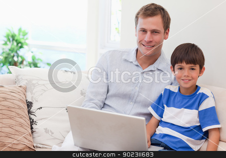 To use this stock image in your creative project, please select the size you need over to the right and click the "Add to Cart" button.
Your downloaded image will come with the Cutcaster watermark removed so don’t worry about the watermark you see on this page. Father and son playing computer games together stock photo, Young father and son playing computer games together by Wavebreak Media