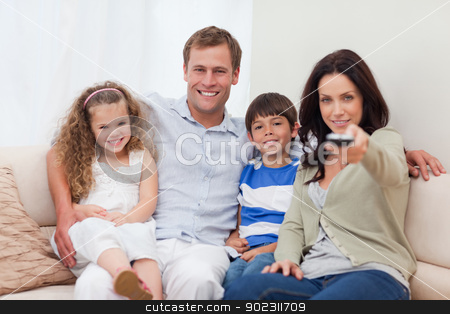 To use this stock image in your creative project, please select the size you need over to the right and click the "Add to Cart" button.
Your downloaded image will come with the Cutcaster watermark removed so don’t worry about the watermark you see on this page. Family watching television stock photo, Young family watching television by Wavebreak Media