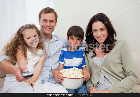 To use this stock image in your creative project, please select the size you need over to the right and click the "Add to Cart" button.
Your downloaded image will come with the Cutcaster watermark removed so don’t worry about the watermark you see on this page. Family watching a movie together stock photo, Young family watching a movie together by Wavebreak Media